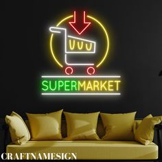 a neon sign that says super market with a shopping cart in the center and an arrow pointing up