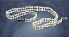 This is a gorgeous, lustrous, delicate, classic necklace which was a part of the sold estate. It was certified and valued by the local Mikimoto dealers. The pearls will come to you with this certificate.  This Mikimoto pearl necklace consists of a single graduated strand of 89 luminous Akoya (or similar) pearls of round shape. Each pearl is meticulously calibrated from 6.9mm largest at the front, working its way down to 3.2mm near the clasp. The colour of the pearls is a wonderful subtle creamy Classic Bridal Necklace For Wedding, Timeless Single Strand Necklace For Wedding, Timeless Single Strand Wedding Necklace, Classic Pearl Necklace With 17 Jewels For Wedding, Elegant High Luster Pearl Necklace For Anniversary, Classic Silver Pearl Necklace With 17 Jewels, Elegant High Luster Necklaces For Weddings, Elegant Single Strand Necklace For Anniversary, Elegant Single Strand Bridal Necklace For Anniversary