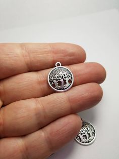 These are a set of 5 silver tree of life charms or pendants. Each charm measures 17 mm wide by 20 mm long. Perfect for a charm bracelet, earrings, and other projects! Check out the other charms in my shop, many to choose from. Thanks for stopping by! Butte Mt, Tree Charms, Silver Tree, Needle Felted Animals, Felt Animals, Tree Of Life, Needle Felting, I Shop, Silver Rings