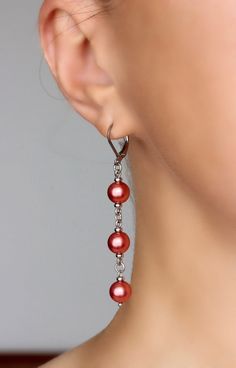 Unique pearl earrings with bright red-pink high quality czech glass pearl coated 8 mm beads, tiny stainless steel beads-separators, steel jumping ringa and stainless steel lever back earring hooks. Earring hooks are from nickel free and lead free metal. The total lenght of earrings is about 65 mm including earring hooks. Perfect jewelry for everyday wear and a great gift! Other earrings of my shop you can see here: https://www.etsy.com/shop/NaTavelli?section_id=13757927 Thanks for visit! Red And Green Jewelry, Pearl Bead Earrings, Red Beaded Earrings, Unique Pearl Earrings, Handmade Earings, Red Bead Earrings, Aluminum Jewelry, Red Pearl, Jewelry Making Earrings