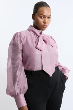 Elevate The Everyday With This Sophisticated Pussybow Blouse. Crafted With A Blend Of Linen And Organdie, This Blouse Has A Lightweight And Airy Feel, Perfect For The Warmer Seasons. The Pussybow Detail Adds A Timeless Touch, While Blouson Sleeves Create A Flattering Effect.Organdie And Linen Fabriclong Sleevespussybow Collarexpertly Designed For Those Uk Size 18/Us Size 14 And Above, Our Plus Size Clothing Collection Is Perfectly Proportioned To Ensure You Look Fashionable At Every Shape.​ Feminine Tops With Bow For Workwear, Feminine Fall Blouse With Bow, Feminine Bow Tops For Workwear, Feminine Bow Tops For Work, Feminine Tie Neck Blouse With Bow, Feminine Tops With Bow And Tie Neck, Tie Neck Blouse With Bow, Tie Neck Blouse With Bow For Daywear, Elegant Blouse With Tie Sleeves For Daywear