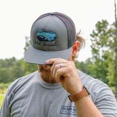 Keeping the hot southern sun out of your eyes and away from your face is important during the heat of June, July and August--both for guys and gals. Our classic, wide-brimmed trucker hat subtly announces your southern roots while shading your head and face. Crown: Structured Pro Crown | Pro-Stitched Finish | Adjustable Snap-Back Visor: Pre-Curved | Curved or Flat - Shape It How You WantSweatband: 3-Part Comfort Cotton FitClosure: Plastic Adjustable Snap-Back Sizes: Adult | One Size Fits Most Flat Shapes, Snap Backs, Wide Brimmed, Your Head, The Heat, Your Eyes, Trucker Hat, Baseball Hats, Heat