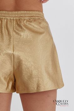 You'll feel so chic, and comfortable in our Pnina Metallic Vegan Leather Shorts. The Pnina Metallic Vegan Leather Shorts boast a sleek and stylish faux leather finish that adds a touch of sophistication to your outfit. This cruelty-free material captures the allure of genuine leather, and the high-waisted silhouette enhances your natural curves and provides a flattering, figure-hugging fit. Plus side pockets that only add a touch of convenience but also offer a subtle yet functional detail that