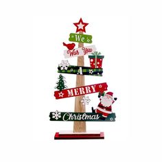 a wooden christmas tree with santa claus and other signs on it's top,