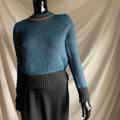 Turquoise With Copper Metallic Thread. 47% Viscose, 17% Acrylic, 13% Polyamide, 12% Wool, 11% Polyester. White Cropped Sweater, New York Sweater, Womens Black Sweater, Hoodie Sweater Dress, Plus Size Kimono, Light Pink Sweaters, Embroidered Kimono, Ribbed Turtleneck Sweater, Fringed Poncho