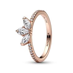 Pandora's Sparkling Herbarium Cluster Ring features three central stones in a petal shape, two marquise-shaped and one pear-shaped. Finished in 14k rose gold plating, this elegant ring is inspired by the beauty of nature, with petal silhouettes that will never go out of style. When styled back-to-back, they form a whole cluster motif, giving an air of completeness to your stack. This ring is a size 7. Pandora Style #: 182392C01-54 Silver Wedding Gifts, Pave Setting Ring, Rose Gold Sparkle, Rose Gold Wedding Bands, Rings Jewelry Fashion, Crystal Ring, Gold Sparkle, Rose Gold Jewelry, Womens Wedding Bands