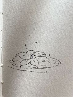 an ink drawing of a cloud with stars on it's side and a star in the middle