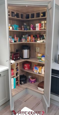 an open pantry with lots of food in it