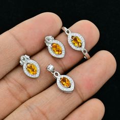 Natural Citrine Ring Earrings & Pendant Set, 925 Sterling Silver, Bridal Jewelry Set, November Birthstone, Wedding Jewelry, Gif For Mother ►Made of solid sterling silver with a rhodium finish (925) ● Code --- Set-1940 ● Main Stone --- Natural Citrine  ● Birthstone Month ---  November  ● Color --- Yellow  ● Gem Size ---  6x4 MM ● Carat Weight --- 1.55 ct. (approx.) ● Total Weight --- 5.23 Gram ● Gemstone Creation --- 100% Natural Some of the amazing additional features of this product: ● Fine, professional cut natural gemstones - not synthetic, lab created, nor simulated ● Elegant, makes beautiful engagement gift; anniversary gift; bridesmaid gift; gift for girlfriend; gifts for mom; gift for fiancée ● Suitable for all special occasions ♥ Benefits of wearing Citrine  gemstone (Healing Prope Fine Jewelry Yellow Gemstones For Wedding, Yellow Gemstones For Wedding Fine Jewelry, Yellow Gemstones For Wedding, Fine Jewelry, Fine Jewelry Hand Set Sterling Silver Sets, Fine Jewelry Sets In Sterling Silver, Fine Jewelry Sets In Sterling Silver Hand Set, Fine Yellow Gemstones For Wedding, Silver Gemstone Fine Jewelry Sets, Sterling Silver White Gold Gemstones For Wedding