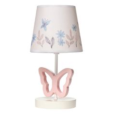 a pink butterfly lamp on a white base