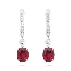 Perfect your attire with these stylish red ruby and diamond earrings. Crafted in 18K white and rose gold, each eye-catching design features a striking cushion-cut red ruby in a rose gold cat claw four-prong setting, topped by a round diamond hanging from a sparkling post. Radiant with 4ct. t.w. these spectacular drops suspend from English lock backs.
3.60 carat cushion cut natural red ruby
0.45 carat pave diamond setting
18k white and rose gold
The earring design can be custo Ruby Drop Earrings, Ruby And Diamond Earrings, Gold Basket, Orange Sapphire, Ruby Earrings, Diamond Settings, Tennis Bracelet Diamond, Salt And Pepper Diamond, Red Ruby