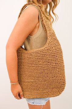 Effortlessly elevate your summer style with our Crochet Rattan Straw Hobo Bag! Handwoven from natural straw, this tote is easy to carry and perfect for your next getaway. Travel in style with our beautiful bag! Crochet rattan straw hobo bag Zippered closure Lined Chic Summer Bags Made Of Natural Fiber, Natural Hobo Bag With Adjustable Strap For Vacation, Eco-friendly Hobo Bag With Adjustable Strap For Vacation, Natural Straw Hobo Bag With Adjustable Strap, Eco-friendly Handwoven Hobo Bag For Vacation, Spring Natural Woven Hobo Bag, Summer Everyday Hobo Bag In Natural Color, Eco-friendly Jute Hobo Bag For Summer, Natural Hobo Bag For Everyday Spring Use