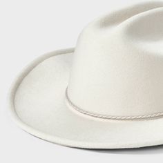 Add a timeless classic to your hat collection with this Western Hat from Universal Thread™. Made from midweight felt fabric in a solid color, this western-style hat features a dented crown and curved brim. Designed with an adjustable fit for comfortable wear, it adds a stylish finishing touch to a wide variety of outfits. Universal Thread™: Found exclusively at Target. Rigid Flat Brim Felt Hat For Country Events, Rigid Short Brim Felt Hat For Rodeo, Country Style Felt Hat With Short Brim, Country Style Rigid Felt Hat With Short Brim, Country Style Short Brim Felt Hat, Country Style Fedora With Flat Brim, Country Style Solid Color Fedora With Flat Brim, Western Style Curved Brim Felt Hat For Ranch, Country Style Felt Hat With Curved Brim For Rodeo