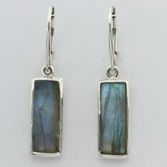 These is a pair of beautiful Earrings with Labradorite. The earrings are made out of solid 925 Silver and there is no nickel or other substances causing most allergies. This makes the earrings hypo allergenic. Size of one Earring in total 4.0 x 0.9 cm or 1.57 x 0.35 inch You will receive the item in a gift box - perfect to surprise someone or yourself. Usually we ship on the same day we receive the payment for the order. We want you to be happy with your purchase. If you do not like what you bou Nickel-free Rectangular Sterling Silver Earrings, Sterling Silver Rectangular Everyday Earrings, Sterling Silver Rectangular Gemstone Earrings, Everyday Sterling Silver Rectangular Earrings, Sterling Silver Oblong Earrings For Gift, Nickel-free Oblong Sterling Silver Jewelry, Silver Rectangular Stone Sterling Silver Earrings, Leverback Earrings, Beautiful Earrings