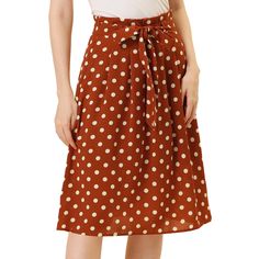 From Monday to Sunday, this skirt is effortless to throw on. Crafted from a lightweight fabric, this skirt features polka-dots prints, an elastic waist, a waist belt, and an A-line silhouette. Simple and vintage, the waist belt lends an elegant touch, making this skirt an option for your next social gathering. With the design of an elastic waist, this skirt can accentuate your graceful figure. Pair it perfectly with sandals or high heels for a stylish look. Spring Skirt With Polka Dot Pattern And Elastic Waistband, Polka Dot Relaxed Midi Skirt, Polka Dot Knee-length Skirt For Summer, Casual Polka Dot Skirt With Elastic Waistband, Relaxed Knee-length Polka Dot Skirt, Summer Polka Dot Skirt With Elastic Waistband, Relaxed Fit Polka Dot Skirt, Polka Dot Knee-length Flowy Skirt, Knee-length Polka Dot Flowy Skirt