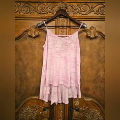 Free People Super Cute Strappy High Low Tank Top In Light Pink. This Semi Sheer Tank Has A Unique Strap Across The Back And A Ruffled Bottom Layer That Adds A Flirty Look To Your Workout Or Athleisure Time. Bundle And Save! Smoke Free, Hypoallergenic Dog Home Summer Tank Tops For Loungewear, Stretch Scoop Neck Vacation Tops, Stretch Scoop Neck Top For Vacation, Pink Relaxed Fit Tank Top For Summer, Relaxed Fit Pink Tank Top For Summer, Pink Relaxed Fit Tank Top For Spring, Relaxed Fit Pink Tank Top For Spring, Pink Scoop Neck Top For The Beach, Summer Cami Top For Layering