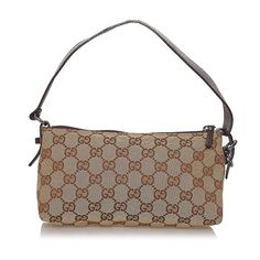 Gucci continues to reinterpret its rich heritage under current Creative Director Alessandro Michele (2015). Maintaining a balance between historical reference and contemporary eclectic flare, the brand’s signature “double g” remains iconic. Gucci has been recognized as a worldwide leader in the luxury goods market for 90 years. Designer Pre-owned Rectangular Shoulder Bag, Pre-owned Designer Rectangular Bag, Formal Pre-owned Rectangular Shoulder Bag, Elegant Pre-owned Rectangular Bag, Pre-owned Monogram Canvas Rectangular Shoulder Bag, Pre-owned Rectangular Monogram Canvas Shoulder Bag, Vintage Monogram Canvas Rectangular Shoulder Bag, Designer Beige Baguette Bag For Formal Occasions, Elegant Pre-owned Monogram Canvas Bag