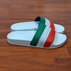 Adidas Adilette Slides 'Italy' (Size Us Mens 6/Wmns 7). Condition Is New Without Box. Come As Seen In Pictures. Any Questions Send A Message. All Items Are Shipped Within 24hrs Of Purchase White Slides With Rubber Sole For Spring, Casual White Slides With Rubber Sole, White Cushioned Slides Slip-on, White Cushioned Slides, White Slip-on Casual Slides, Adidas White Slip-on Sandals, White Non-slip Adidas Slides, White Slides With Rubber Sole And Round Toe, White Round Toe Slides With Rubber Sole