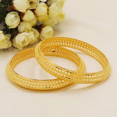 22kt Yellow Gold Bangle Bracelet Party Festive Wear Wedding Jewelry,  Metal is Real Gold Purity is 22kt Weight - 23.45 grams approx (2 pieces )  Length - 6.0 cm approx Inner Diameter (please contact for different size) Width -  10.5 mm approx  max Please feel free to ask if you have any query.