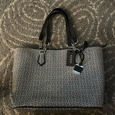 Black And Grey Large Guess Purse/Handbag Never Used Brand New Tickets Still On It. Send Offers Trendy Gray Satchel For Shopping, Chic Gray Shoulder Bag For Errands, Gray Top Handle Bags For Travel, Gray Top Handle Travel Bag, Gray Shoulder Bag Satchel For Shopping, Trendy Gray Shopping Bag, Gray Satchel Bag For Shopping, Gray Tote Bag For Shopping, Gray Top Handle Shopping Bag