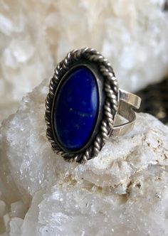 Sterling Silver Blue Lapis Lazuli Native American Vintage Ring Face of ring measures over 1 inch tall Ring size 8 Classic Blue Lapis Lazuli Rings, Adjustable Blue Crystal Gemstone Ring, Blue Bohemian Jewelry With Metal Ring, Handmade Adjustable Lapis Lazuli Rings, Adjustable Blue Sapphire Open Ring, Adjustable Blue Crystal Ring, Bohemian Blue Jewelry With Metal Ring, Handmade Blue Sapphire Open Ring, Blue Bohemian Open Ring Jewelry