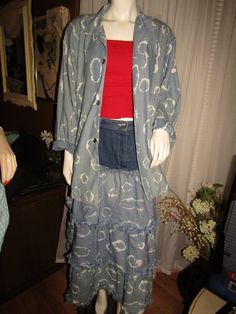 "80's/90's ladies blue/white tie die/denim look skirt set by Bis/Gene Ewing. The all cotton long sleeve shirt has big shoulder pads, in a size medium, front button closure, left box chest pocket, and white tie dye print. The all cotton skirt in a size 12 has a blue denim/skirt top, with a shredded /fringed layered blue/white tie dye bottoms. Front skirt top has a metal zipper closure, and a fake back pocket look on the back right side. Set is in Excellent condition. Shirt--- Shoulders 21 1/2\", Ladies Denim, Box Chest, Big Shoulders, Blue Denim Skirt, 80s Dress, Cotton Long Sleeve Shirt, Denim Style, Style Skirt, White Tie