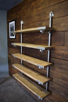 the shelves are made out of wood and metal