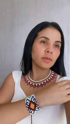 Product made by Colombian artisans highlighting our indigenous ancestral culture 100% handmade Material is precious Czech bead number 10, totally woven in suitable yarn We guarantee quality work and guarantee it "Path that runs through the neck." Necklace that grants distinction to the woman who wears it, telling her story and role in the community. Girls wear them small, and women wear them large in relation to what they have experienced. The clothing of the Emberá is particular, through the garments and particularly their accessories, they tell stories. With monkey teeth, bones and seeds they made necklaces, bracelets and appliques, which were supplanted with beads (beads or beads) made of plastic or fiberglass and bright colors. Southwestern Style Beaded Necklace For Festivals, Handmade White Beaded Southwestern Necklace, Bohemian Handwoven White Beads, Southwestern Style Fair Trade Festival Jewelry, Artisan Multicolor Macrame Jewelry, Southwestern Handwoven Beaded Necklaces For Gifts, Southwestern Handwoven Beaded Necklace For Gift, Southwestern Handwoven Beaded Necklace As Gift, White Handwoven Necklace For Festivals