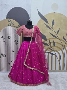 Fabric : 👉 Taffeta silk lehenga with sequence & zari work  ( 3 meter flair ) 👉 Taffeta silk blouse with sequence work all over front & back ( Unstitch ) 👉 Net Dupatta with sequence work & border work CARE INTRODUCTION:- HAND WASH \ ONLY DRY AND CLEAN What is meaning of semi stitched Product :- Semi stitch lehenga means that the pattern of the lehenga is ready and only the fitting of the lehenga as per your waist and height(waist to floor) has to be done. The blouse(Choli) of lehenga is UN-sti Semi-stitched Art Silk Choli For Eid, Semi-stitched Party Wear Choli For Eid, Party Wear Semi-stitched Choli For Eid, Silk Lehenga With Resham Embroidery For Party Wear, Eid Semi-stitched Art Silk Choli, Semi-stitched Festive Lehenga, Party Wear Choli With Resham Embroidery In Raw Silk, Festive Semi-stitched Lehenga, Pink Lehenga With Dori Work In Tissue Silk