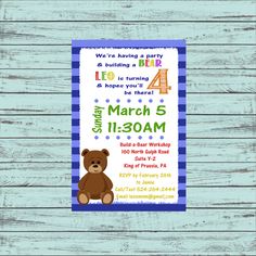 a blue and white striped birthday card with a teddy bear