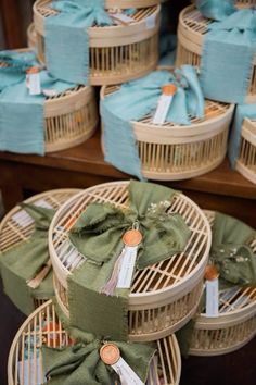 several baskets with ribbons tied around them