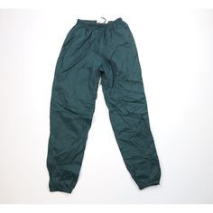 Vtg 90s Nike Mens S Mini Swoosh Cuffed Nylon Joggers Pants Green Mens Pants Blemishes on cuffs. Has color fade Mens size Small Measurements are: 12 inches across the waist laid flat 30 inch inseam 40 inches from top to bottom Green Nylon US Shipping is FREE Canada is $15 and International is $24 Check out my other items in my store! PR1038 Nike Joggers Mens, Nike Hose, Green Pants Men, Jogging Nike, Nike Jogger, Joggers Nike, Nike Casual, Nike Joggers, 90s Nike