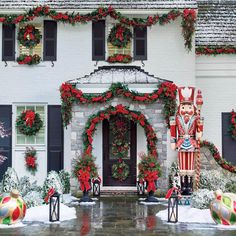 a house decorated for christmas with ornaments and decorations