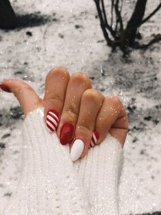 #Thanksgiving Nails #Winter Nails #November Nails #Christmas Nails Christmas Nails Inspiration Red, Cute Simple Christmas Nails Almond, Almond Candy Cane Nails, Winter Nails Almond Shape Red, Santa Almond Nails, Almond Nails Christmas Designs Simple, Red Oval Christmas Nails, Short Oval Nails Acrylic Christmas, Christmas Nails Acrylic Round