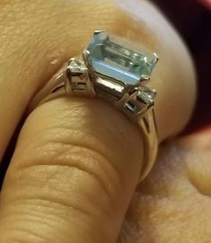 Gorgeous Vintage platinum ring set with magnificent natural aquamarine center natural aquamarine in emerald shape nice blue color aquamarine weight 2.51 carat size 9x7mm very nice luster,beautiful medium blue color. very sparkly,very brilliant stone ,very clean,sparkly. side two natural diamonds total weight 0.35ct G-SI1 ring size 5.5 Retail value $4,500 net . Appraisal available Emerald Cut Light Blue Topaz Ring With Accent Stones, Light Blue Emerald-cut Topaz Ring With Accent Stones, Light Blue Emerald Cut Topaz Ring With Accent Stones, Fine Jewelry Emerald Cut Topaz Ring Gia Certified, Gia Certified Emerald Cut Topaz Ring, Octagon Blue Topaz Ring For Anniversary, Classic Light Blue Emerald Cut Jewelry, Blue Aquamarine Baguette-cut Rings, Aquamarine Rings With Baguette Cut Accent Stones