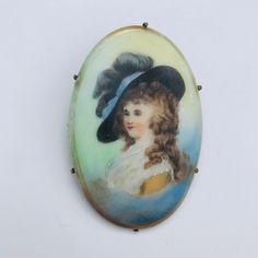 A hand-painted porcelain brooch depicting an 18th century woman. Possibly a reference to the Duchess of Devonshire. Beautifully done, and exceptional piece of historical jewelry. Victorian Style Enamel Pin Gift, Duchess Of Devonshire, The Duchess Of Devonshire, 18th Century Women, Victorian Brooch, Victorian Hand, Historical Jewellery, The Duchess, Hand Painted Porcelain