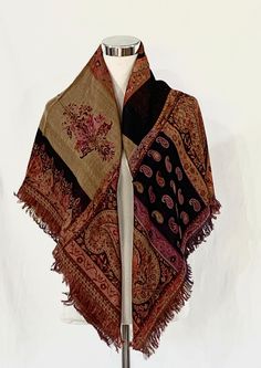 "Effortlessly transform a simple look into chick look with this natural wool and silk blend reversible Jacquard shawl/scarf.  This paisley pattern shawl/scarf in shades of Black,Orange red, Beige and purple. This shawl has been expertly hand woven in Kashmir, using traditional techniques, to bring you a truly beautiful, timeless traditional paisley Jacquard shawl you will use time and time again. Use this shawl in any way such as a shawl/wrap/scarf during the winter, a piece of decor for the hou Fall Wrap Shawl Scarf, Traditional Brown Shawl One Size, Bohemian Pashmina Shawl For Fall, Fall Pashmina Dupatta, Fall Shawl Wrap, Bohemian Brown Shawl Wrap, Bohemian Paisley Print Scarves For Fall, Bohemian Paisley Print Scarf For Fall, Fall Bohemian Pashmina Shawl In One Size