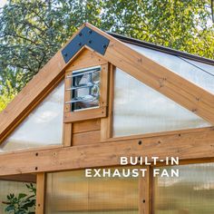 a wooden structure with an exhaust fan on it's side and the words built - in exhaust fans below