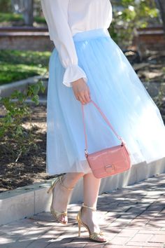 Light blue Fully lined Elastic waist Full skirt Paired with our Suzy top Modeled in medium 5'6" 100% Polyester Small (waist 28-36”/length 29" (lining) 32" (tulle)) Medium (waist 30-38”/length 29" (lining) 32" (tulle)) Large (waist 32-40”/length 29" (lining) 32" (tulle)) Blue Long Tulle Skirt, Blue Tulle Long Skirt, Long Tulle Skirt For Spring, Blue Full Tulle Skirt, Spring Voluminous Tulle Petticoat, Blue Tulle Skirt For Summer, Spring Tulle Skirt With Lined Detail, Spring Tulle Skirt With Lining, Blue Tiered Tulle Skirt