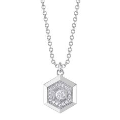 This 14Kt white gold pendant features a hexagon shape with a total diamond weight of .11 carats. It comes with a chain for easy wear. Octagon White Gold Diamond Necklace Gift, White Gold Octagon Diamond Necklace Gift, White Gold Octagon Diamond Necklace For Gift, White Gold Diamond Cut Octagon Necklace, Fine Jewelry Diamond Octagon Necklace, Fine Jewelry Octagon Diamond Necklace, Fine Jewelry Diamond Necklace With Octagon Shape, Diamond Octagon Necklace With Brilliant Cut, Octagon Diamond Necklace Gift