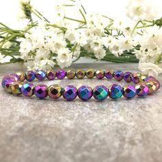 ✦Gemstone:Hematite  ✦Color: Rainbow ✦Shape: Faceted Round  ✦Length: 5''-9'' ✦Bead Size: 6mm ✦QTY: 1 pc / package ✦✦Please measure your wrist size, then order your bracelet. Experience the harmonizing energy of our Handmade 6mm Faceted Round Rainbow Hematite Bracelet, meticulously crafted to enhance your meditation and promote balance. This bracelet showcases vibrant rainbow hematite beads that are believed to resonate with the Root Chakra, grounding your energy and providing a sense of stability. It makes a meaningful holiday gift for yourself or a loved one. ✱Carefully handcrafted with intention and attention to detail. ✱An ideal gift for those interested in chakra healing and meditation. ✱Each bracelet is unique due to the natural variation in rainbow hematite beads. PLEASE NOTE: ▪️ Plea Rainbow Hematite, Hematite Jewelry, Grounding Energy, Healing Gemstone Bracelets, Meditation Bracelet, Hematite Bracelet, Color Rainbow, Chakra Bracelet, Hematite Beads