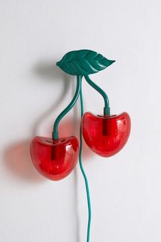 The cherry on top of your lighting display, this sconce infuses your space with whimsical appeal. Features a stem of cherries with translucent red shades that diffuses a vibrant glow throughout. Plugs in to power on. Available exclusively at Urban Outfitters. Features Shaped sconce Cherry silhouette Translucent red shades Plug in Requires 2 E12 LED 6W bulbs - not included UO exclusive Content + Care Glass, iron Wipe clean Imported Made in compliance with US electrical standards. To use this item Dream Dorm, Red Shades, Uo Home, Cherry On Top, Teen Room, Dream Decor, Dream House Decor, My New Room, Estilo Retro