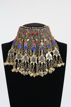 Afghan Jewellery Authentic Traditional Handmade choker. Get in contact with us if there is any queries regarding the item. Check out my page for other items. Help my small business and promote Afghan culture by placing an order with us. We have different kinds and types of Afghan Vintage Jewelleries! Your feedback is much appreciated. Please let us know the item arrived safely! Afghan Jewellery, Afghan Culture, Multicolor Necklace, Handmade Chokers, Afghan Jewelry, Stones Necklace, Vintage Choker, Boho Choker, Wedding Jewellery Necklace