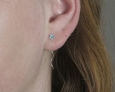 Very very delicate sterling silver threader earrings with a small forget me not flower. The flowers' front is light blue enameled. The chain ends with a curved pin which threads easily through the earhole and twists nicely around when moving.... The earrings are very light, comfortable to wear and there is no chance of loosing them. A matching ring is also available in my shop via: https://www.etsy.com/your/shops/VillaSorgenfrei/tools/listings/page:7,view:table,stats:true/511288299 All my items Silver Threader Earrings, Forget Me Not Flower, Earrings Dainty, Matching Rings, Threader Earrings, Forget Me Not, Stud Earring, Diamond Earrings, Blossom