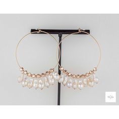 Experience elegance and glamour with these stunning baroque pearl hoop earrings! These beautiful hoop earrings feature bright and shimmering baroque pearls, in shades of white, cream, pink, green, and lavender, are perfectly complemented by rose gold-filled hoops and hematite beads. These pearl statement earrings are not only unique, but also beautiful and perfect for adding a touch of elegance to any outfit. Make an impression and stand out with these gorgeous pearl hoops that are sure to inspi