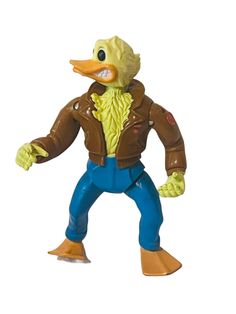 a toy duck wearing a brown jacket and blue pants