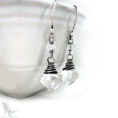 "Herkimer Diamond & Rock Crystal Quartz Sterling Silver Dangle Earrings * Genuine Rock Crystal Quartz and gemstones have been wire wrapped in sterling silver and dangle from handmade sterling silver ear wires. The sterling silver was oxidized to a deep charcoal finish, then brushed and polished to bring out the silver highlights. This creates a natural, organic finish with depth & shine. Herkimer Diamond are double-terminated crystal quartz from the Herkimer, NY mines. The focal quartz stones are crystal clear with very few inclusions; in addition, the gems are cut in a fantastic and unique 'cushion' diamond shaped cut. The quartz are finely faceted for excellent sparkle and light reflection. Truly unique and stunning little gems! Herkimer Diamond & Crystal Quartz are often used as an alte Wire Wrapped Crystal Earrings For Jewelry Making, Nickel-free Adjustable Briolette Earrings, Nickel-free Crystal Earrings For Anniversary, Sterling Silver Wire-wrapped Crystal Drop Earrings, Wire Wrapped Briolette Earrings For Anniversary, Sterling Silver Faceted Drop Crystal Earrings, Adjustable Faceted Silver Earrings, Anniversary Wire Wrapped Jewelry, Adjustable Nickel-free Sterling Silver Crystal Earrings