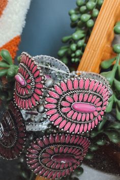 Dress up your outfit with this pink concho western bracelet! This bracelet pairs perfectly stacked with other or worn alone. Throw it on with a graphic tee to dress it up, or wear it with a cute romper or dress to a country concert! stretch bracelet pink + silver Southern Roots Boutique112 W Main St Paragould, AR Handmade Pink Southwestern Jewelry, Pink Bohemian Bracelets For Spring, Pink Western Jewelry, Adjustable Pink Bohemian Cuff Bracelet, Bohemian Adjustable Pink Cuff Bracelet, Pink Bohemian Adjustable Cuff Bracelet, Adjustable Pink Jewelry For Festivals, Handmade Adjustable Pink Cuff Bracelet, Adjustable Handmade Pink Cuff Bracelet