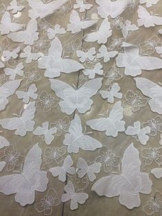 white lace with butterflies on it