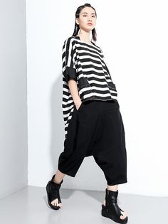 Sku CY-!63274 Material Cotton-blend , >50%Cotton Style Loose , Irregular clipping , Short Sleeves Feature Striped , Split-joint Neckline Round-neck Occasion Casual , Original Creation Seasons Summer Type T-Shirts Tops Color BLACK Size FREE SIZE Model's weight:50kg_ Model's height:170cmï¼66.93inches) Please consult the size chart we provide for this item's measurements to help you decide which size to buy.Please note: There may be 1-3cm differ due to manual measurement. INCH Upper Arm Circumference Bust Raglan Sleeve Length Sleeve Opening FREE SIZE 16.14 51.18 17.72 23.62-33.46 14.96 Cotton Style, Raglan Sleeve, T Shirt Top, Free Size, Neck T Shirt, Length Sleeve, Round Neck, Cotton Blend, Short Sleeves